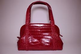 Nancy Gonzalez red crocodile tote. Slightly used. Retails $4000. STARTING BID: $800 --- FIND MORE ITEMS ON OUR LIVE AUCTION WEBSITE! 