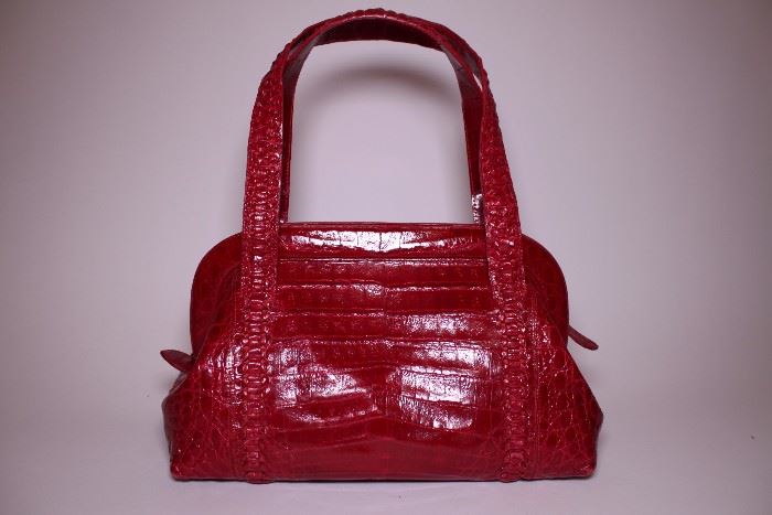 Nancy Gonzalez red crocodile tote. Slightly used. Retails $4000. STARTING BID: $800 --- FIND MORE ITEMS ON OUR LIVE AUCTION WEBSITE! 