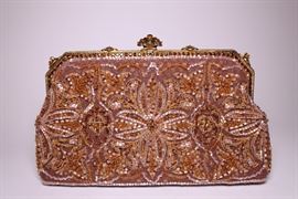 You can find the details of this item under the 'Designer Handbags' along with many other amazing items on our live auction website at www.gravesopendoor.com