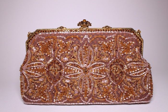 You can find the details of this item under the 'Designer Handbags' along with many other amazing items on our live auction website at www.gravesopendoor.com