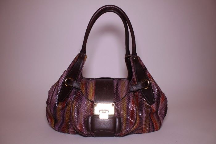 Jimmy Choo phython hobo bag. Like new. Retails $2500-$3000. STARTING BID: $500 -- FIND MORE ITEMS ON OUR LIVE AUCTION WEBSITE! 