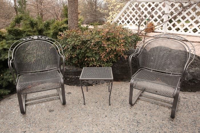 1 of 2 metal patio spring chairs with flower and leaf design. Approximate Retail $135.  