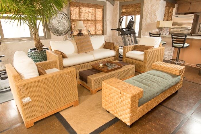 Rattan sofa with cotton duck upholstered cushions.  Smith Hawken.  Approximate Retail $1,895. 