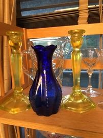 Vaseline glass candlesticks and cobalt glass vase