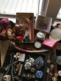Pocket watches, compacts. perfumes, costume jewelry, brooches, lockets, pearls, necklaces, charm bracelets clip-on earring and much more