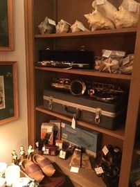 Sea shells, wind instruments, walkie talkie, dutch shoes