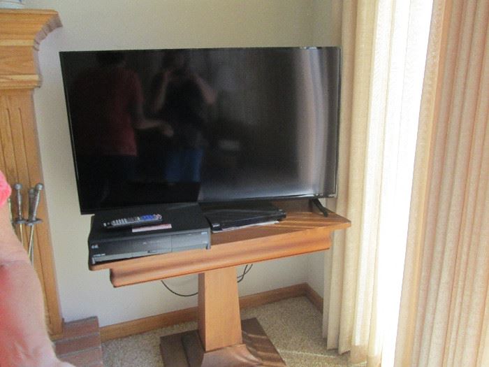 Flat screen TV, handmade wooden stand