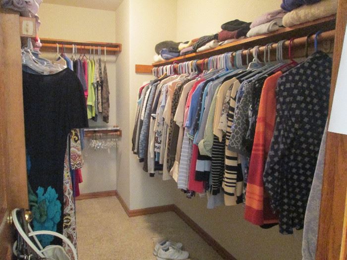 Closet full of lovely clothing, lots of high end