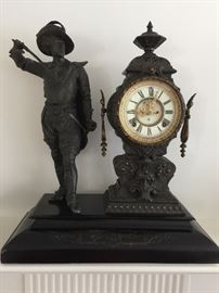 Bronze Ansonia Mantle Clock Porcelain Face w/ Bronze Musketeer Attached on an Onyx Base (18’’ x 8’’ x 21’’)