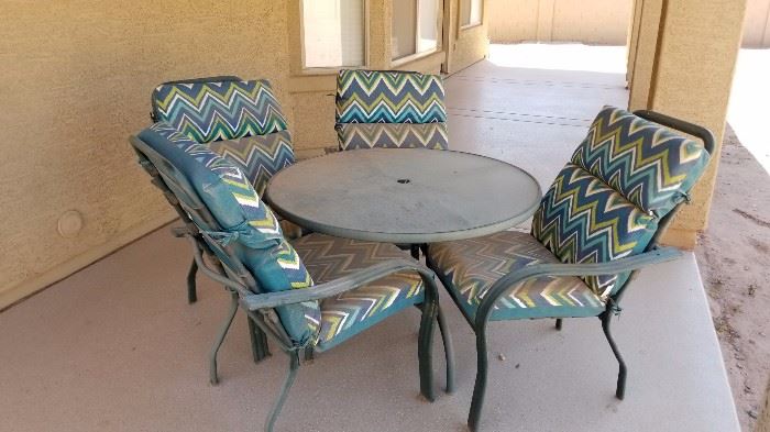 Patio Table w/ 4 chairs and Umbrella (not pictured)  $185