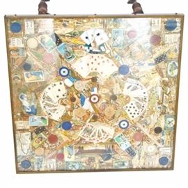 Early 20th C. Tobacco Card Top Games Table: An antique tobacco card top games table, ca. 1900. Adhered under an epoxy resin top and framed by brass tone metal, are original tobacco advertisement baseball cards from the early 20th century. Notable cards include Hall-of-Famers, T206 Christy Mathewson, T206 Ty Cobb (Bat on Shoulder Variation) and Nap Lajoie. The table stands on four ring-turned legs ending in talon feet, each clutching a clear glass orb.