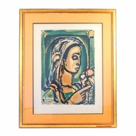 George Rouault Restrike Lithograph of a Woman in Profile: A restrike lithograph in colors after the French modernist George Dominique Rouault (French, 1904-2002). The work is unsigned, as is typical of many of the artist’s series, and housed in a modern frame under glass. A copyright symbol is evident to the lower left of the plate.