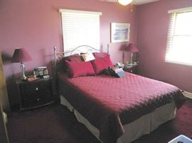 Nice metal queen metal frame with foundations.  Cherry night stands match dresser.