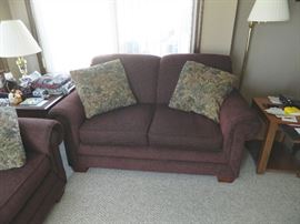Wonderful fairly new maroon dark wine colored Lazy Boy loveseat - has matching sofa.  Broyhill side tables.