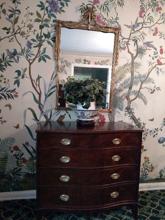 Antique English four drawer mahogany chest with gilt decorated framed mirror