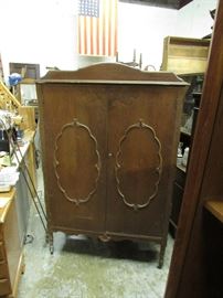 Armoire with internal drawers and hanging