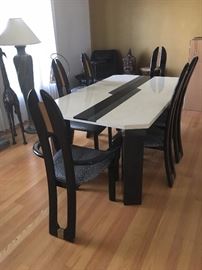 Dining room table & chairs, custom designed table will expand to seat 10 with 2 leaf inserts.  Black lacquered finish on table legs and chairs, with cheetah pattern