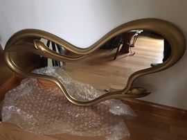 Uniquely shaped resin mirror
