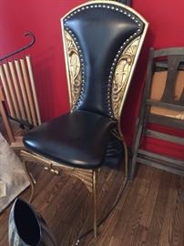 Beautifully detailed gold/black leather chair
