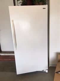Upright KENMORE freezer with plenty of room to store!