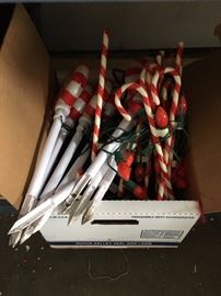 Candy cane lights on stakes