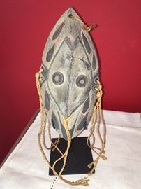 African mask on stand
