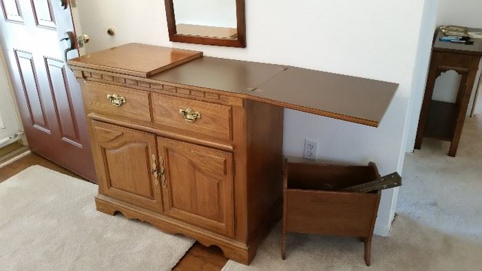Buffett/Serving Bar has a drawer and doors for storage.