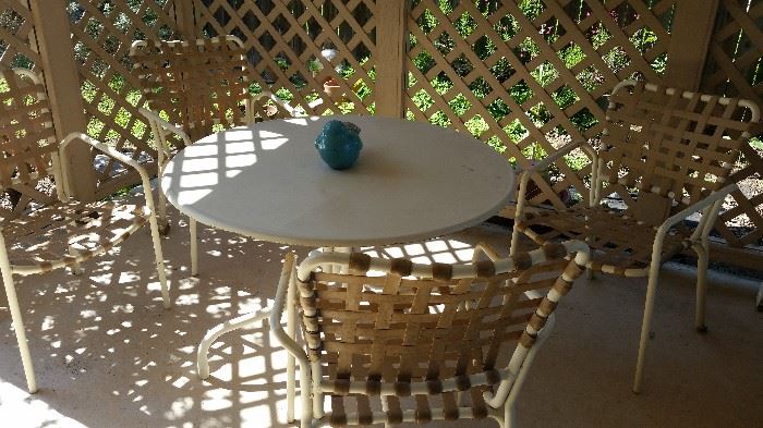 Outdoor table with 4 chairs.