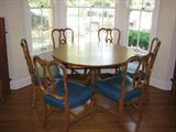 tulip table and 6 chairs