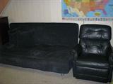 futon and leather recliner