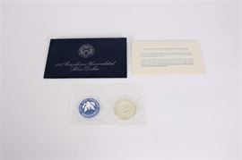 1974-S Uncirculated Eisenhower Silver Dollar: A 1974-S uncirculated Eisenhower silver dollar. Designer: Frank Gasparro. Mintage: 1,900,156. Metal Content: 40% silver, 60% copper. Diameter: 38.5 mm. Weight: 24.6 grams. Very Good condition. Uncirculated.