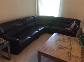 Black leather Natuzzi sectional