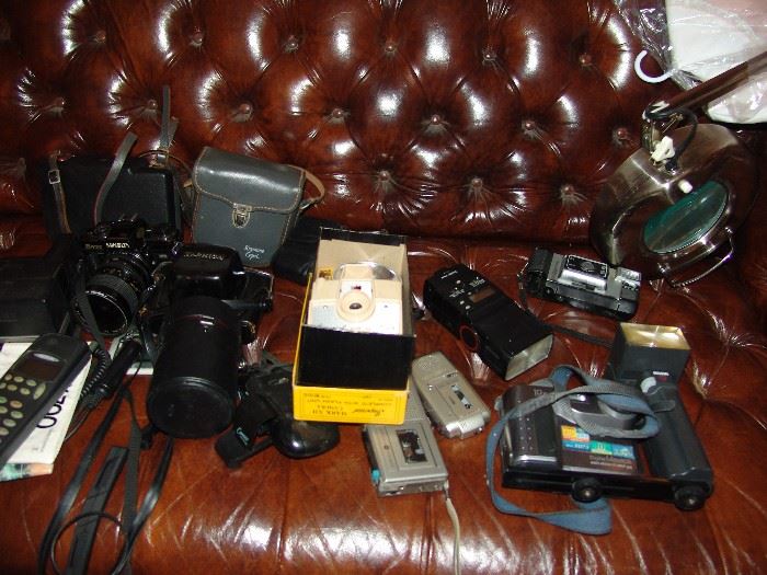 Collection of old camera, movie camera, and 35 mm cameras