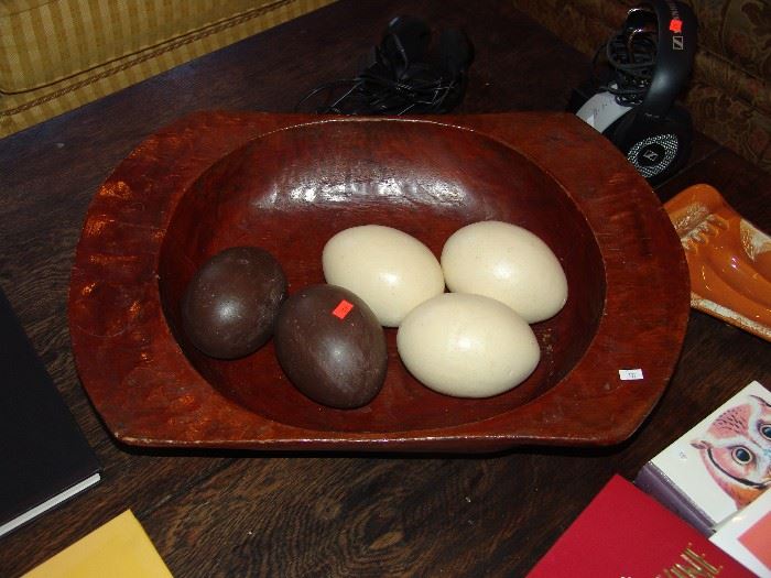 Wood carved bowl with ostrich eggs