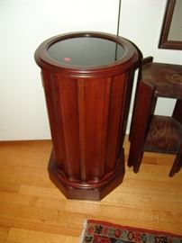 Mahogany circular pedestal table with door