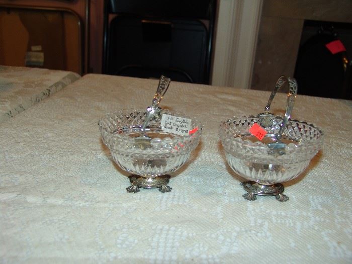 Pair English cut glass sauce bowls with silver handles