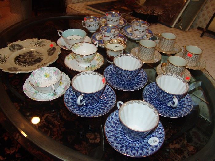 Collection of English and Russian cups and saucers