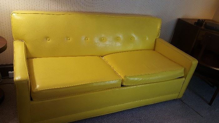 They call it "mellow yellow"  .... but "mellow" it isn't!!   Awesome, fun piece!   And it's a hide-a-bed, too!         