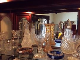 Glass & porcelain in the lighted China cabinet 