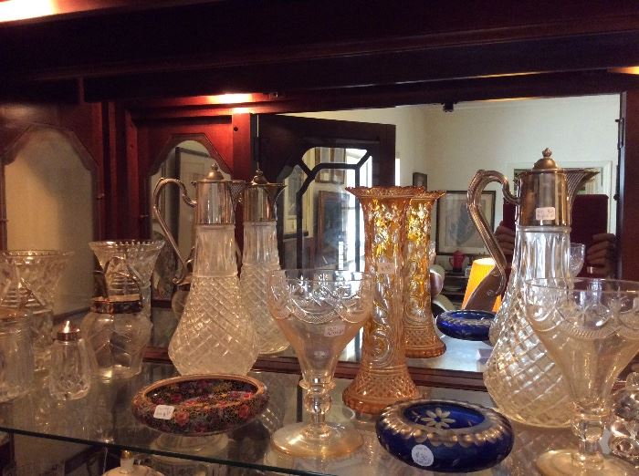 Glass & porcelain in the lighted China cabinet 