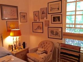 Art, brass bed, South American blanket, ladies chair, brass lamp