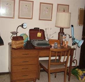 desk, artwork, typewriter, lamps, various decorative items