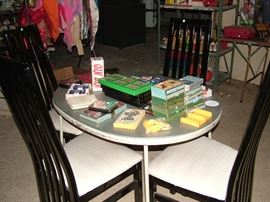 playing card collection, black and white dining chairs, costumes, toys
