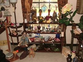 tons of decorative collectibles including figurines, lots of signed sculptures and decorative objects, antique lamps, art pottery, so many items!
