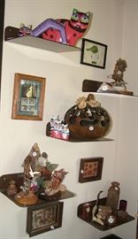 various wood collectibles and sculptures signed by the artist, wall art