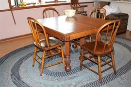 Antique square table and chairs; large braided rug