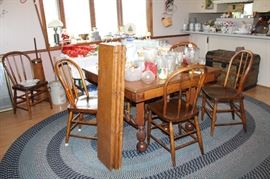 Square antique kitchen table with six chairs and five leaves. Beautiful table! 