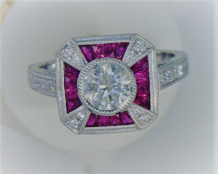 14K white gold Ruby and diamond ring - .51 ct ruby, .65 ct center diamond, .15 ct. small diamonds 