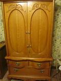 Armoire in Queen size bedroom suite.