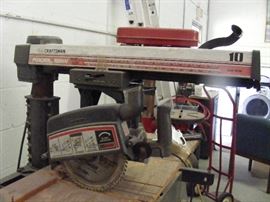 same picture we have one radial saw $125.00